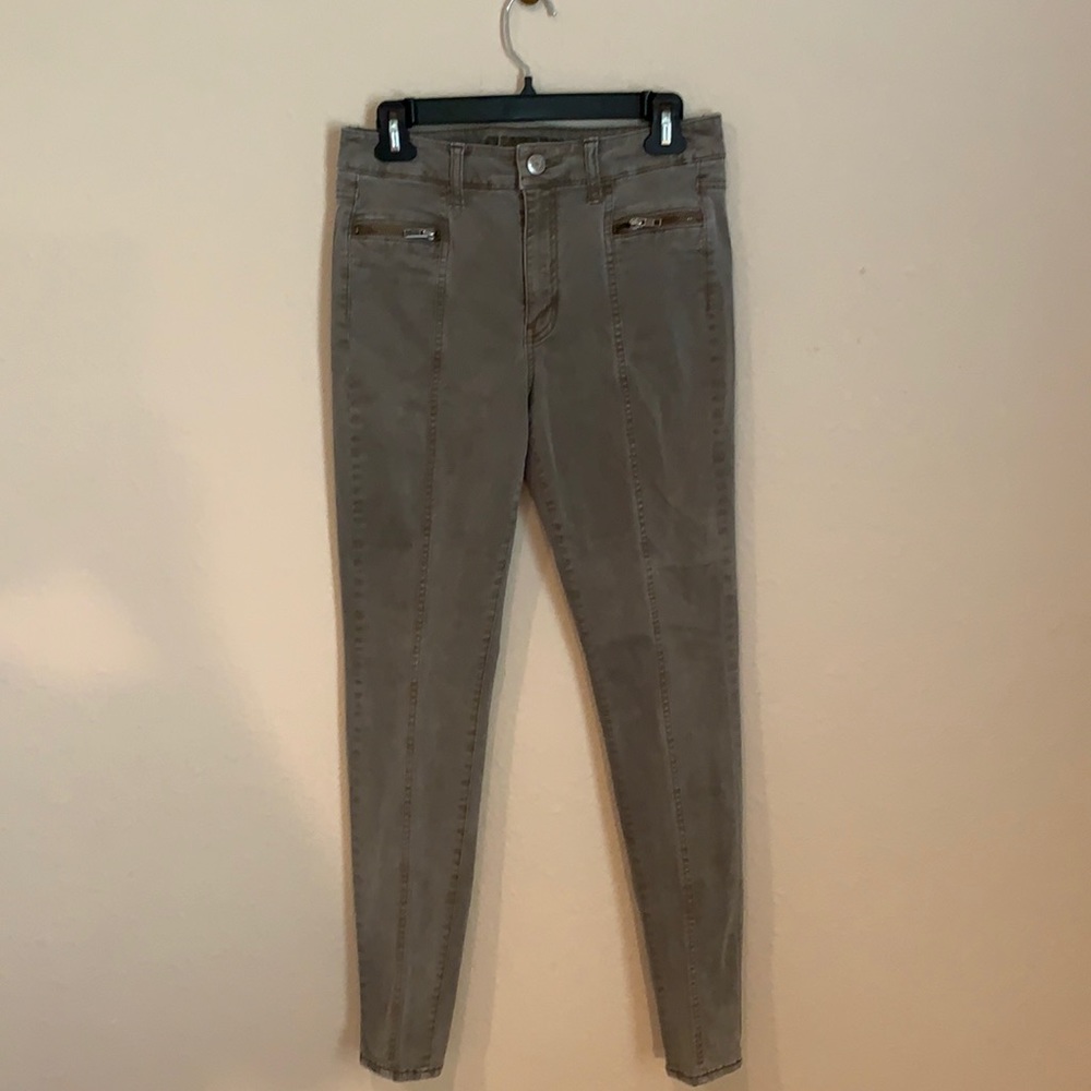 Khaki Green trousers. Slimming style. Mid rise front seam leads to skinny ankle